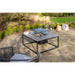Cosiloft 100 Black and Grey Fire Pit Table outdoors with plate cover