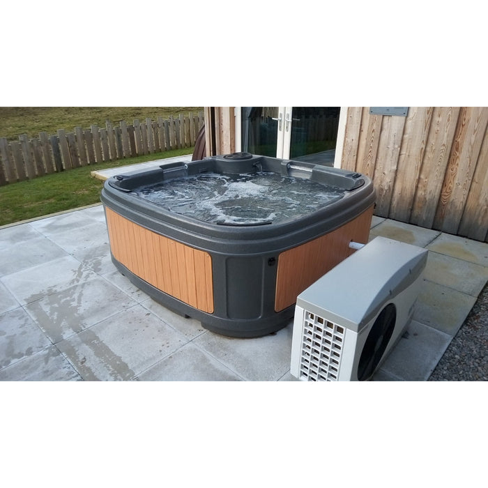 RotoSpa DuraSpa S160 granite grey and teak lifestyle outdoor arrangement with heat pump