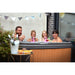 RotoSpa DuraSpa S380 Granite grey and teak lifestyle outdoor arrangement with 4 people drinking in the tub