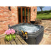 RotoSpa DuraSpa S380 granite grey and grey lifestyle outdoor arrangement with champagne