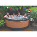 RotoSpa QuatroSpa Granite grey and teak panel lifestyle outdoor arrangement with 5 people bathing