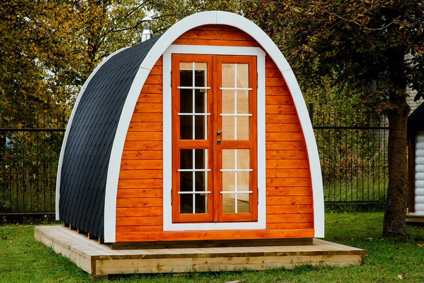 Sauna pod lifestyle outdoor arrangement on a wooden platform