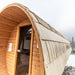 Viking Industrier Sauna barrel 1.9 x 3m with eco-friendly roof outdoor lifestyle arrangement close up front view bitumen roof shingles